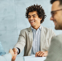 smiling professional seals the deal