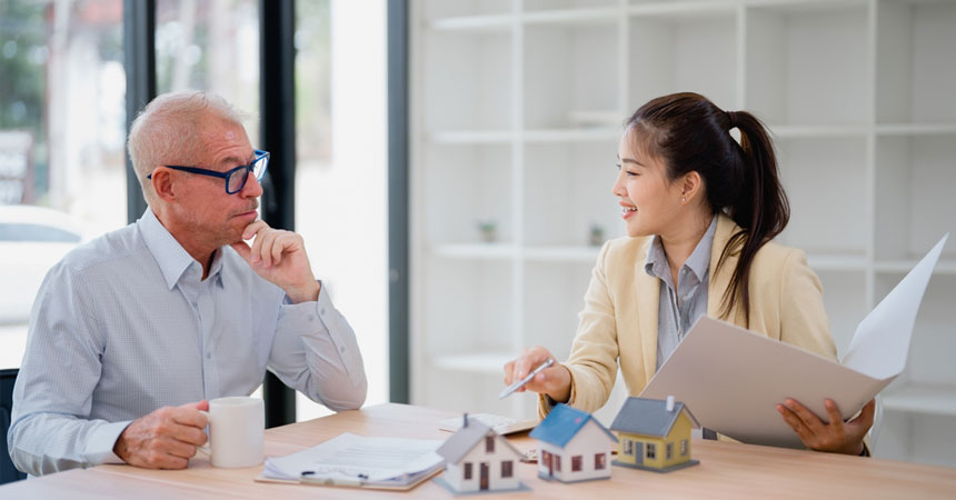 property consultation meeting at desk